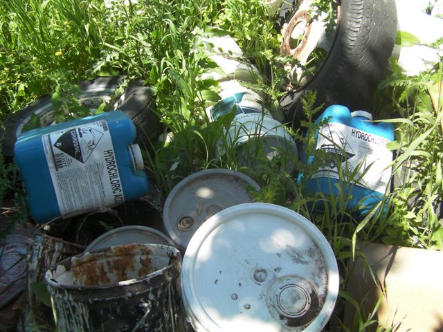 Containers of chemical waste.