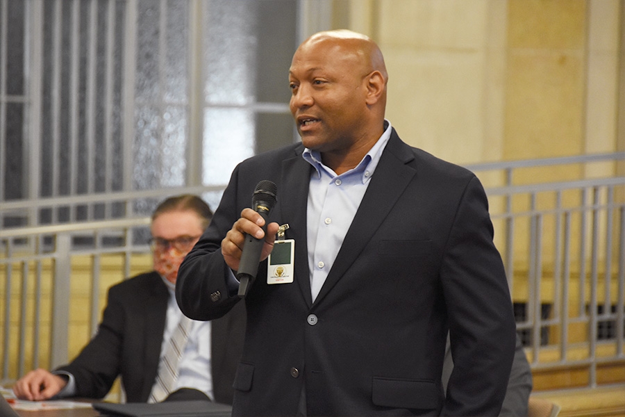A Reentry Coordination Council member shares his knowledge of obstacles to re-entry with the participants.