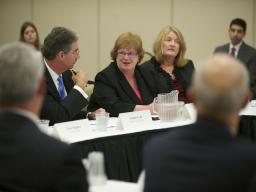 Deputy Attorney General James M. Cole listens intently during a panel discussion about IP theft.