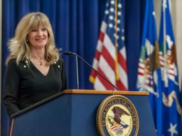 OIP Director Melanie Ann Pustay welcomes everyone to the Department of Justice's fourth anniversary celebration of Sunshine Week.