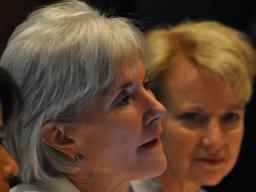 Department of Health and Human Services Secretary, Kathleen Sebelius, sits alongside Assistant Attorney General for the Office of Justice Programs Laurie O. Robinson