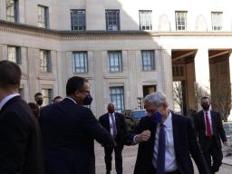 Monty Wilkinson, who served as Acting Attorney General, greets Judge Garland as he arrives for his first day as Attorney General.