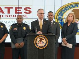 Special Agent in Charge Fred Milanowski of the ATF Houston Field Office delivers remarks from the podium.