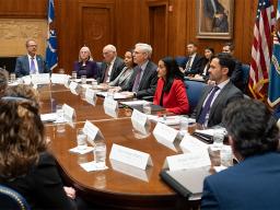 The Attorney General Merrick B. Garland speaks from the round table to senior staff and press in the Attorney General’s conference room.