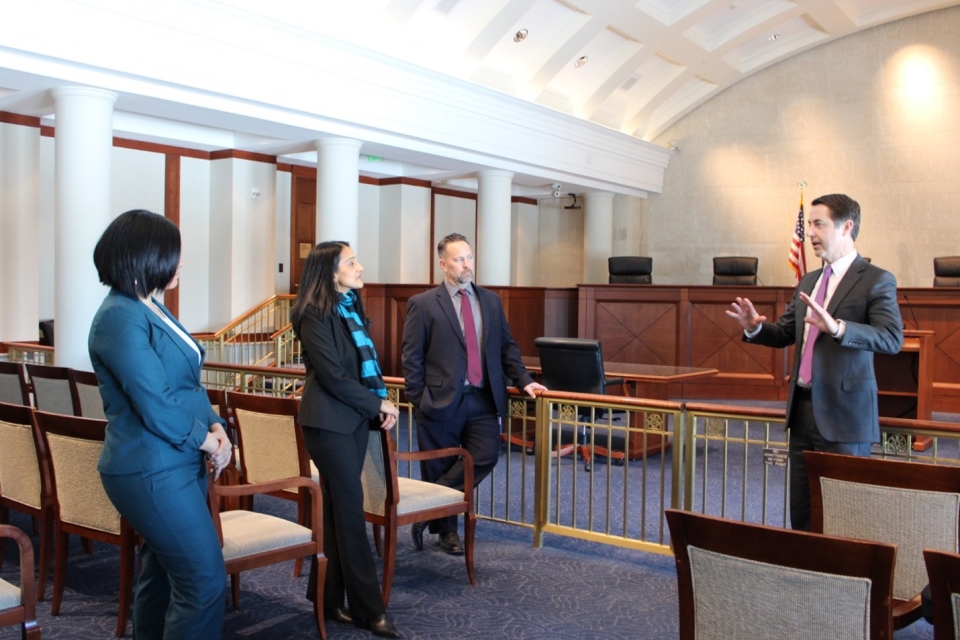 Associate Attorney General Vanita Gupta (left center) with Access to Justice Director Rachel Rossi (left), Iowa State Public Defender Jeff Wright (right center) and Iowa Supreme Court Justice and Chair, Access to Justice Commission Matthew McDermott (righ Associate Attorney General Vanita Gupta (left center) with Access to Justice Director Rachel Rossi (left), Iowa State Public Defender Jeff Wright (right center) and Iowa Supreme Court Justice and Chair, Access to Justice Commission Matthew McDermott (right).