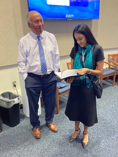 Assembly Speaker and Secretary-Treasurer Sheldon Boyd (left) briefing Associate Attorney General Gupta (right) on the Band’s implementation of Justice Department-supported grant programming.