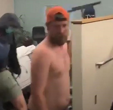 Close up of Schinzing inside the Corrections Records Office on May 29, 2020 before the fire is ignited Close up of Schinzing inside the Corrections Records Office on May 29, 2020 before the fire is ignited