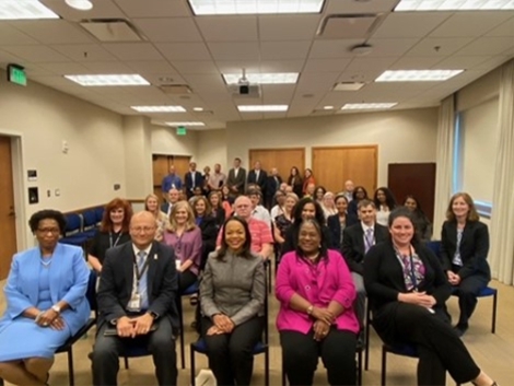 Assistant Attorney General Clarke and U.S Attorney LaMarca with the staff for the Southern District of Mississippi.