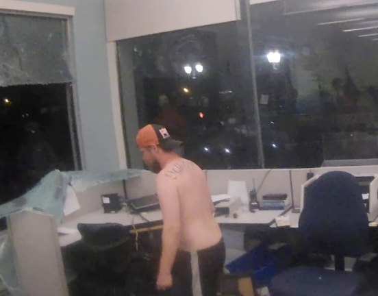Schinzing inside the Corrections Records Office on May 29, 2020 before the fire is ignited Schinzing inside the Corrections Records Office on May 29, 2020 before the fire is ignited