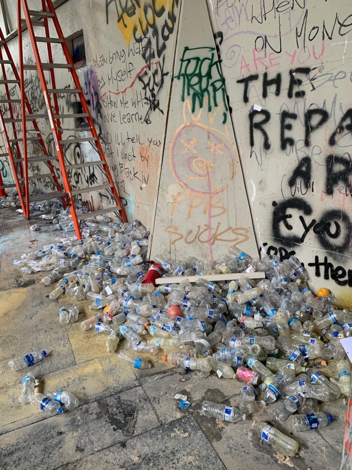 Water bottles used as projectiles piled near entrance to Hatfield Federal Courthouse