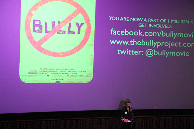 Student Services Director Barbara McClung talks with students prior top viewing Bully