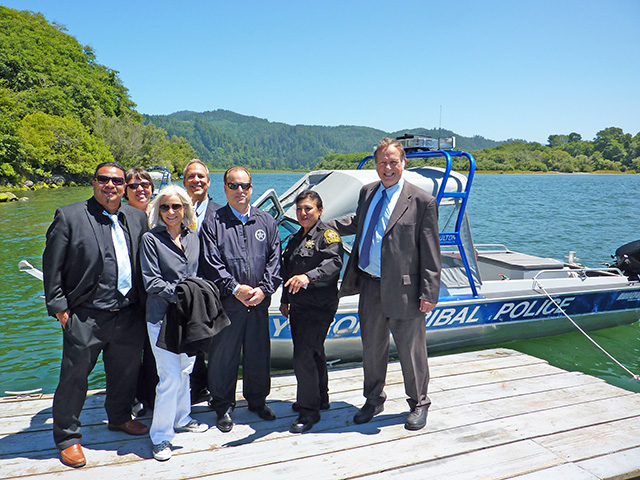 U.S. Attorney Melinda Haag joined by Javier Kinney, Director of the Office of Self Governance of the Yurok Tribe, Joyce Mosier, Humboldt County District Attorney Paul Gallegos, U. S. Marshal Donald O’Keefe, Yurok Police Chief Mary McQuillen, and John Corbett, Yurok Tribal Attorney while visiting the Yurok reservation.