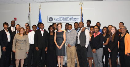 United States Attorney Sally Quillian Yates, Assistant United States Attorney and Community Outreach Coordinator Loranzo M. Fleming, and Community Outreach Specialist Danielle Sweat, PhD., with John Marshall Law Students and Booker T. Washington High School Students