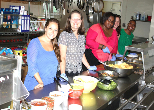 United States Attorney’s Office Staff preparing to serve dinner at the Covenant House of Georgia on July 23, 2014.  Raquel Leibovitch, Law Student Intern; Meghan Starr, Law Student Intern; Leslie Abrams, AUSA; Skye Davis, AUSA; DeShanta Cox, Legal Assistant (L to R). 