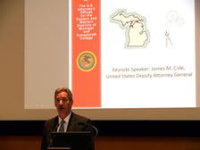 Deputy Attorney General James Cole addresses industry representatives at the Protecting Michigan's Technology conference at Schoolcraft College in Livonia.