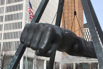 The Fist of Joe Louis symbolizes Detroit's resilience.